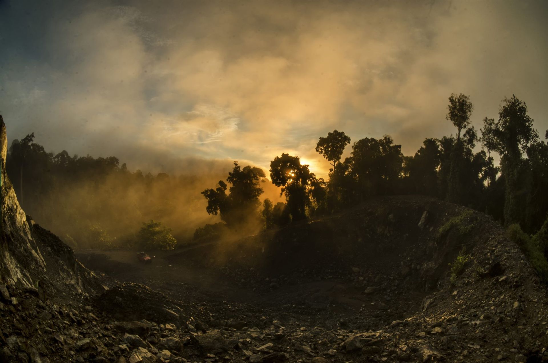Misty sunrise over Deramakot forest valley